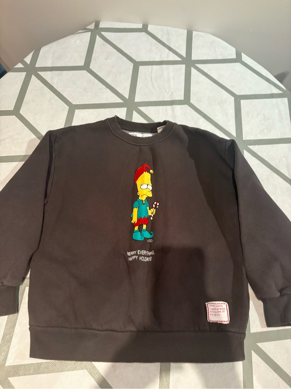 3/15$ Zara Black Crewneck Sweatshirt with Festive Cartoon Graphic